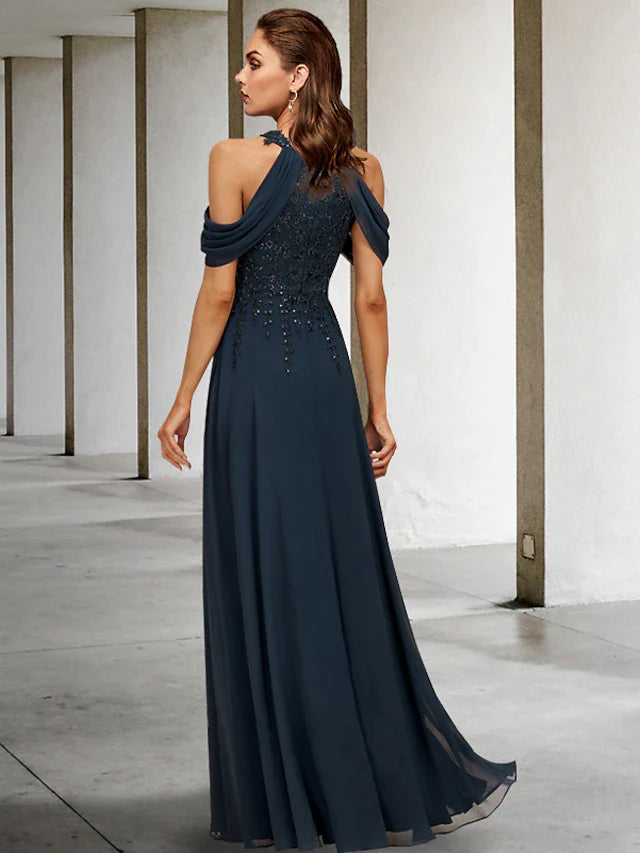 Back view of the elegant A-line halter Mother of the Bride dress, showcasing sequin appliques.
