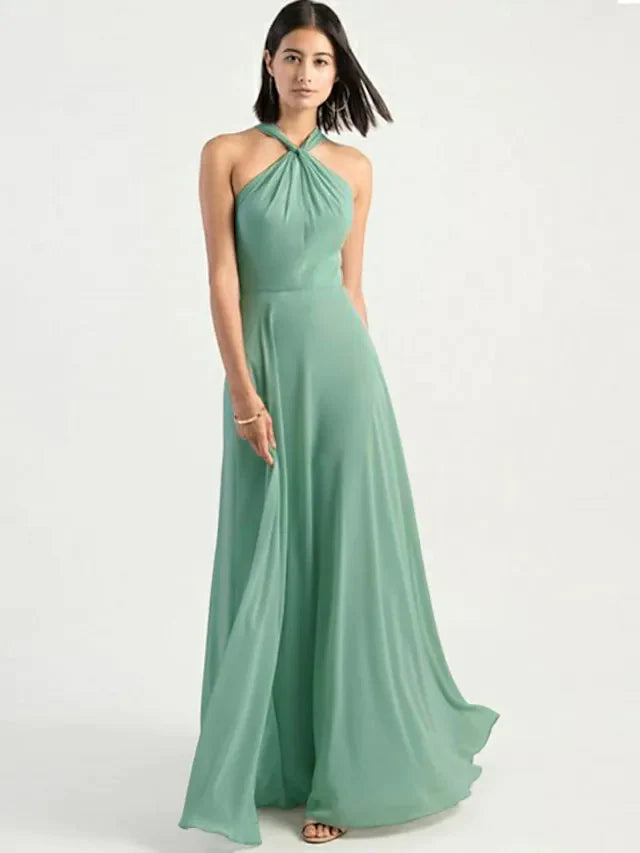 Side view of a blue A-line halter neck chiffon bridesmaid dress, showing the flowing skirt.