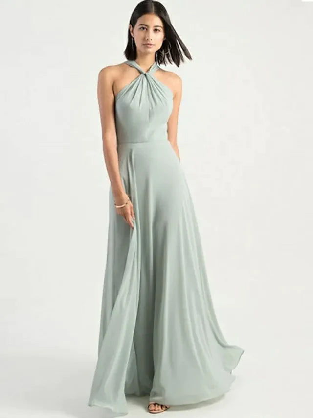 Close-up of the halter neck and bodice details of a blue chiffon bridesmaid dress.