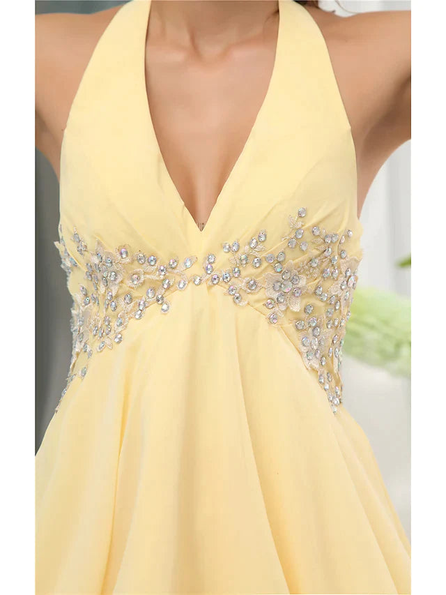 Back view of a sleeveless A-line chiffon dress with halter neck.