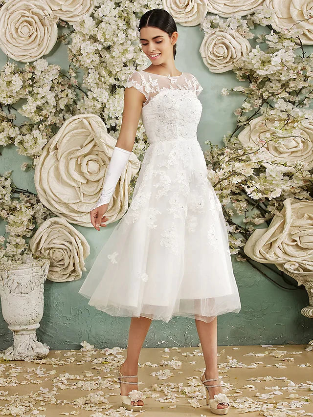 Side profile of a bride wearing the A-line chiffon wedding dress.