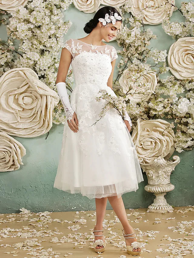 Close-up of the halter neckline and bodice of the wedding gown.