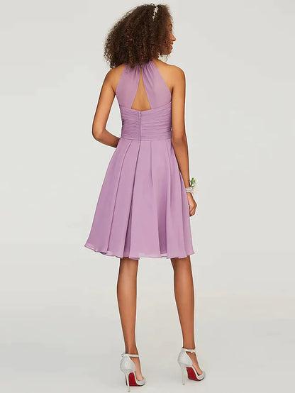 A-Line halter neck knee-length chiffon bridesmaid dress with ruffles, side view.
