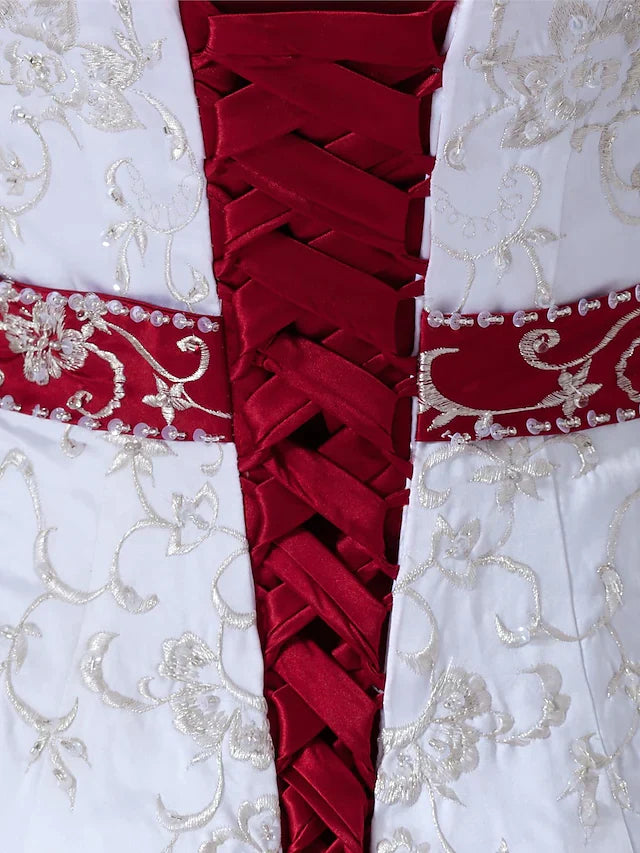 Full length view of the A-line halter neck wedding dress, displaying the complete bridal look with its chapel train.
