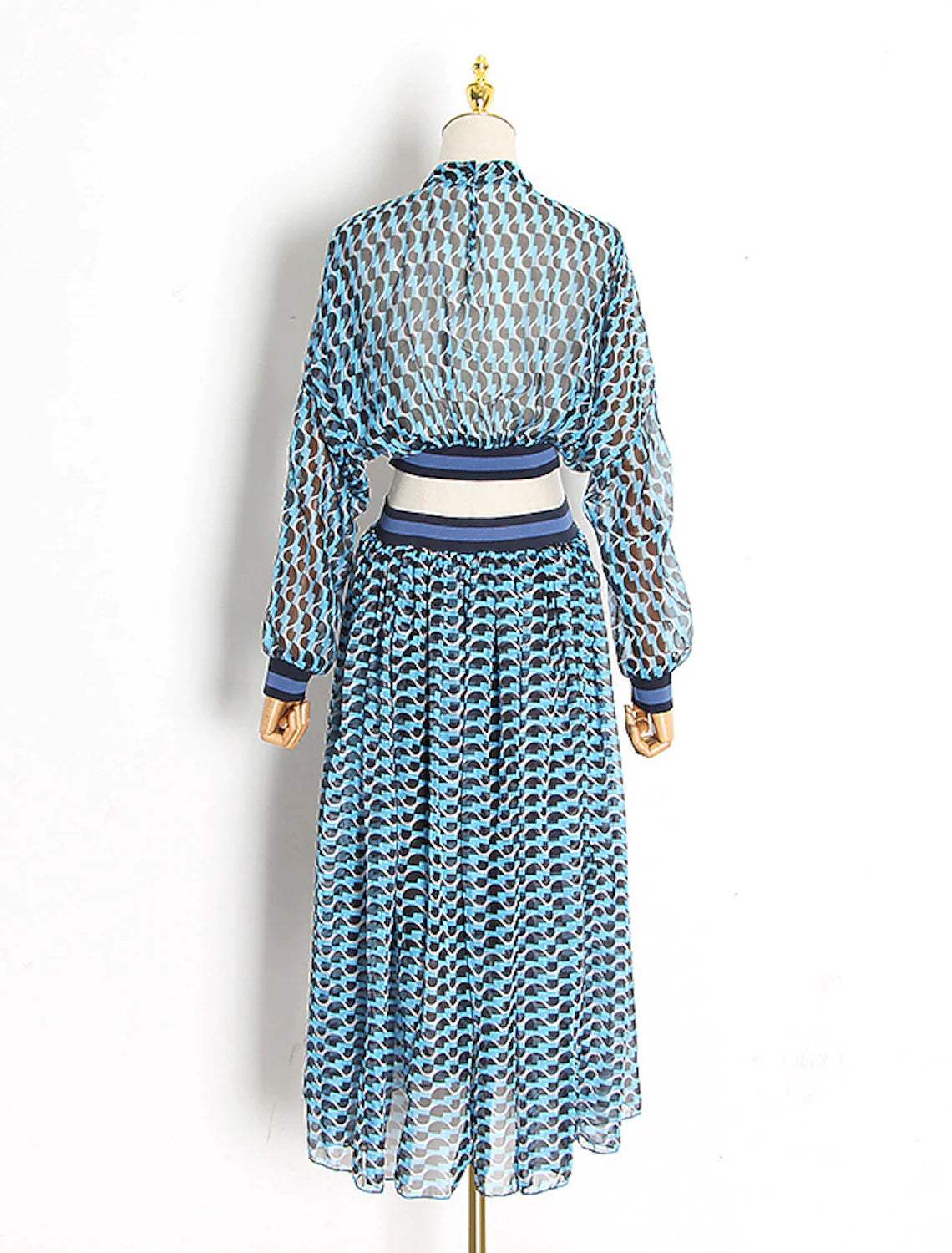 Side view of woman in A-line floral print chiffon dress.