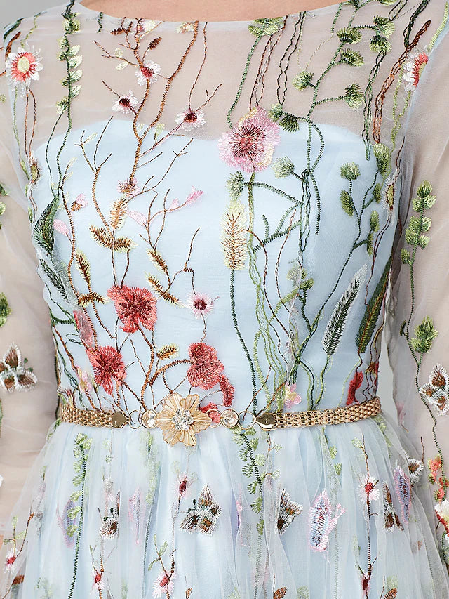 Close-up of the illusion neckline and intricate lace embroidery on the gown.