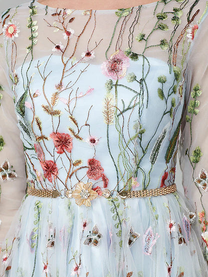 Close-up of the illusion neckline and intricate lace embroidery on the gown.