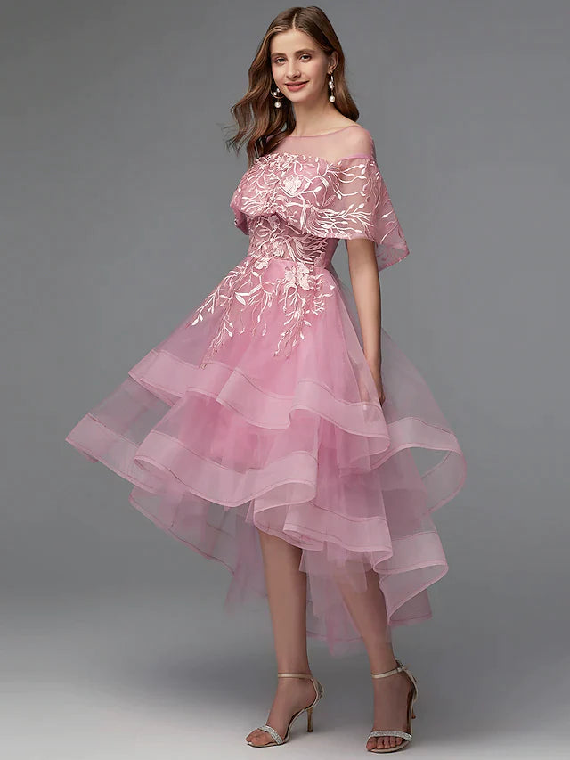 Close-up of the illusion neckline and lace bodice on the dark dress.