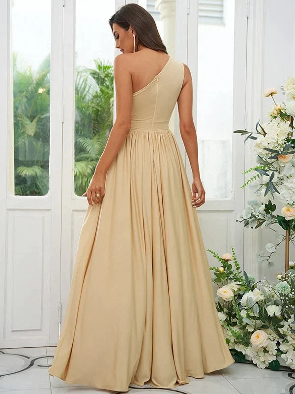 Back view of the floor-length jersey bridesmaid gown.