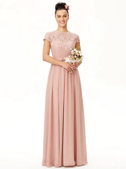 Model wearing an elegant A-line chiffon and lace bridesmaid dress with a jewel neck and sash.