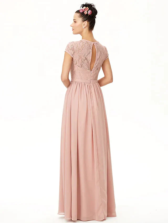 Close-up of the delicate chiffon and corded lace fabric on the bridesmaid dress.