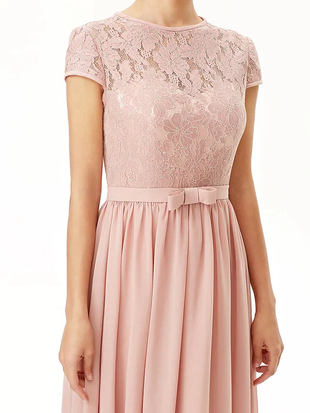 Back view of the A-line bridesmaid dress, showcasing the sash ribbon bows and pleats.