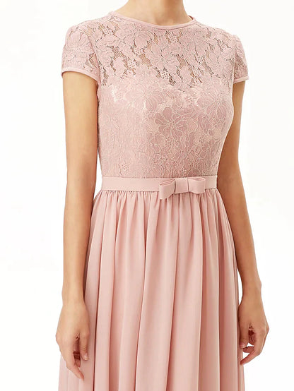 Back view of the A-line bridesmaid dress, showcasing the sash ribbon bows and pleats.