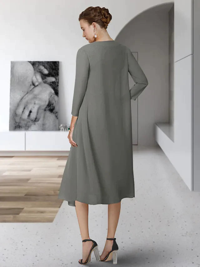 Side view of the Mother of the Bride dress, highlighting the chiffon lace and appliques.