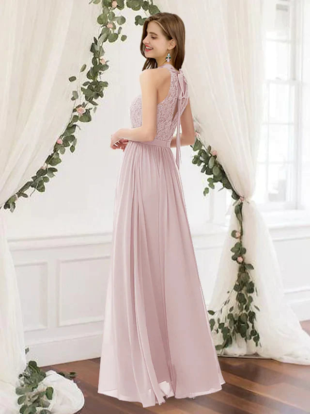 Floor length A-Line bridesmaid gown featuring a jewel neck and pleated chiffon.