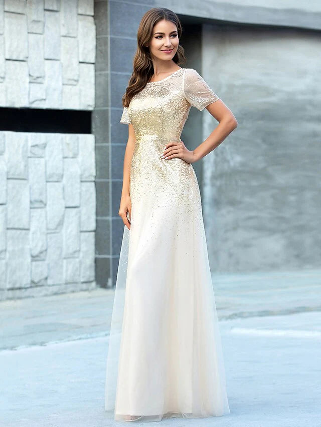 Model gracefully posing in a floor length A-line sequin bridesmaid dress.