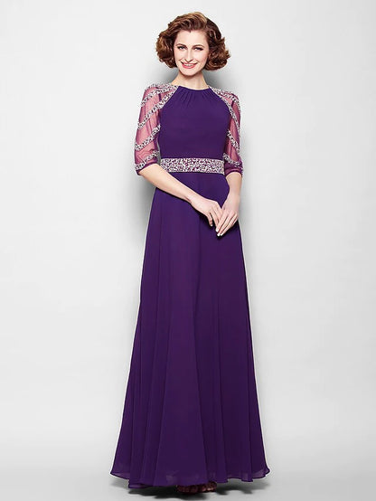 Elegant A-line mother of the bride dress with jewel neck, half sleeves, and beading.