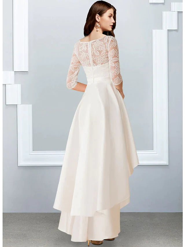 Side view of A-Line wedding dress, highlighting asymmetrical design and ruffles.