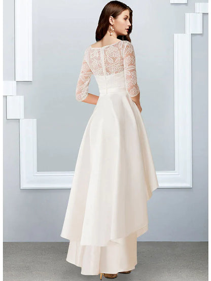 Side view of A-Line wedding dress, highlighting asymmetrical design and ruffles.