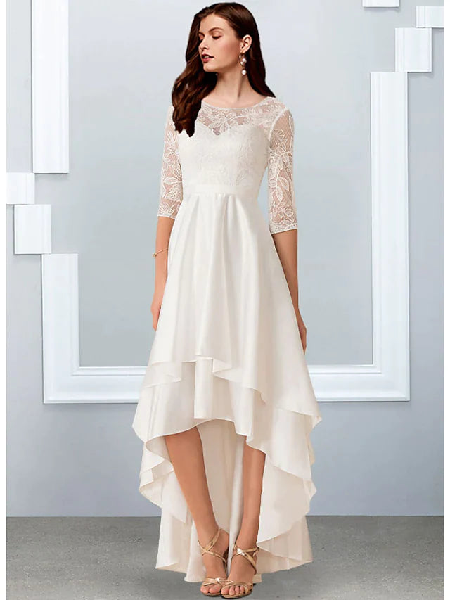 Back view of A-Line wedding dress, showing flowing chiffon and lace fabric.