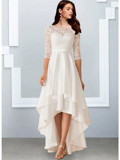 Close-up of jewel neck and half sleeve details on the wedding dress.