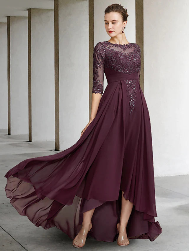 Elegant A-Line Mother of the Bride dress with jewel neck and half sleeves.
