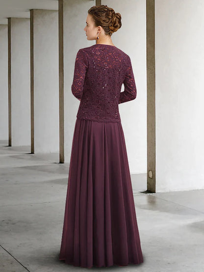 Side view of a woman wearing a blue two-piece A-Line Mother of the Bride dress, highlighting the flowing skirt and half.
