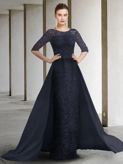 Woman in elegant A-line mother of the bride dress with jewel neck, lace bodice, half sleeves, and pleated chiffon skirt.