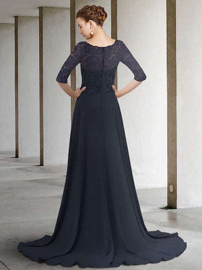 Side view of woman in A-line mother of the bride dress, showing flowing chiffon skirt and half sleeves.