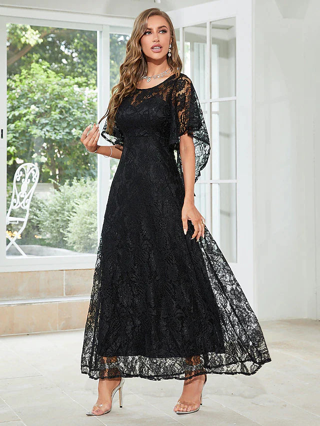 Back view of elegant A-line dress with half sleeves and appliques.