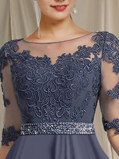 Close-up of jewel neck and half sleeves on Mother of the Bride dress with crystal appliques.