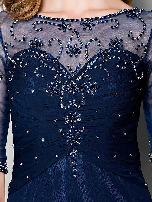 Back view of the elegant A-line dress, highlighting the tulle overlay.
