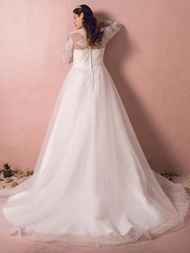 Back view of A-line wedding dress showing court train and lace details.