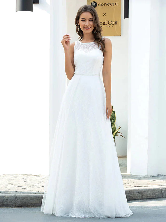 Model wearing an A-line jewel neck lace tulle wedding dress, front view.