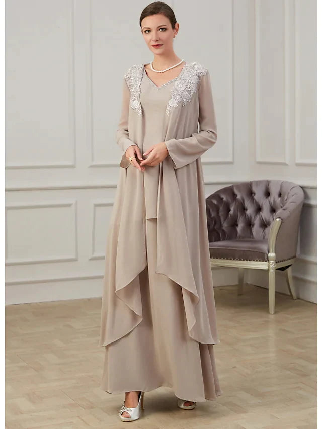 Elegant A-Line Mother of the Bride dress with jewel neck and long sleeves, adorned with appliques.