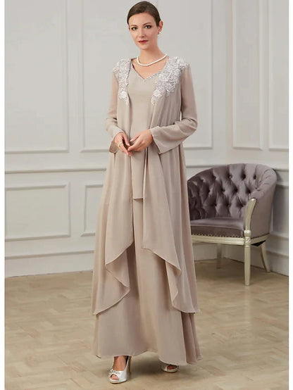 Elegant A-Line Mother of the Bride dress with jewel neck and long sleeves, adorned with appliques.