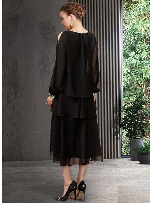 Side view of the A-Line chiffon gown, showing asymmetrical hem and sequin details.