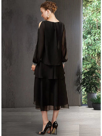 Side view of the A-Line chiffon gown, showing asymmetrical hem and sequin details.