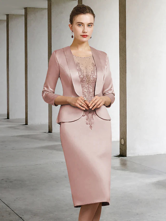 Elegant dark blue Mother of the Bride dress with jewel neck, long sleeves, and lace appliques.