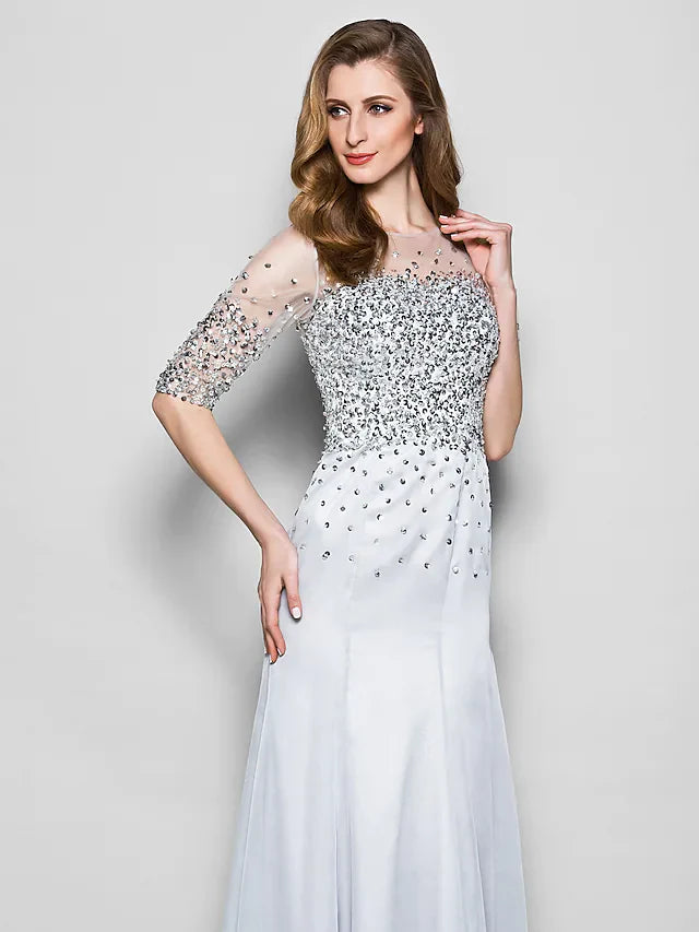 Side view of the floor-length organza Mother of the Bride dress with beading.