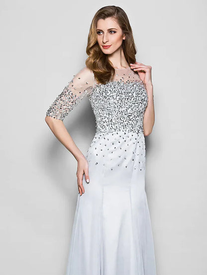 Side view of the floor-length organza Mother of the Bride dress with beading.