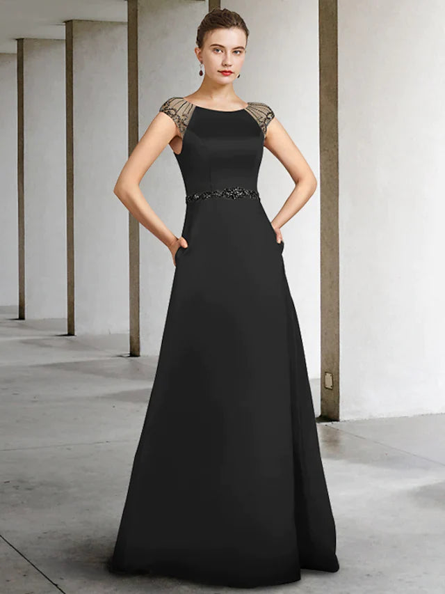 Elegant A-Line Mother of the Bride dress with jewel neck and sash ribbon, front view.