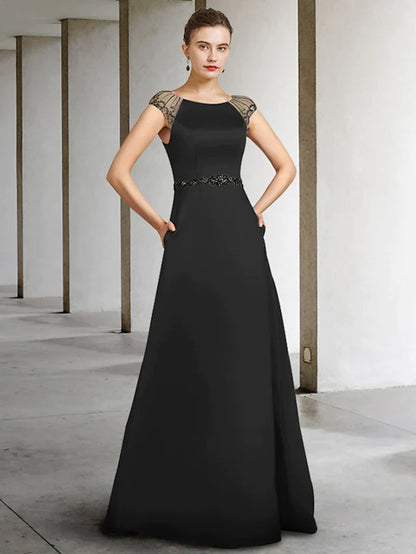 Elegant A-Line Mother of the Bride dress with jewel neck and sash ribbon, front view.