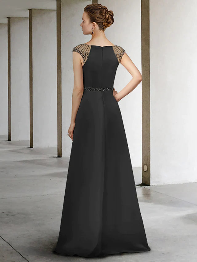 Back view of the A-Line satin gown, showcasing the floor-length skirt and sash detail.