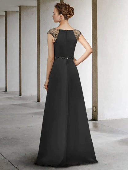 Back view of the A-Line satin gown, showcasing the floor-length skirt and sash detail.