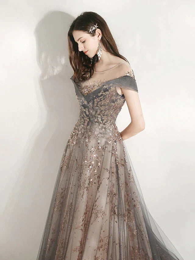 Back view of A-Line tulle bridesmaid dress with crystal bandage detail.