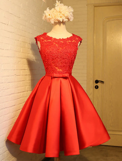 Back view of the A-Line lace dress, highlighting the open back design.