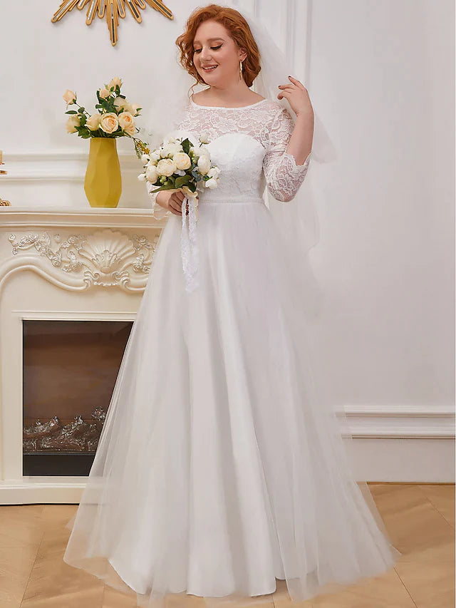 Back view of the white A-line wedding dress, showcasing the flowing tulle skirt.