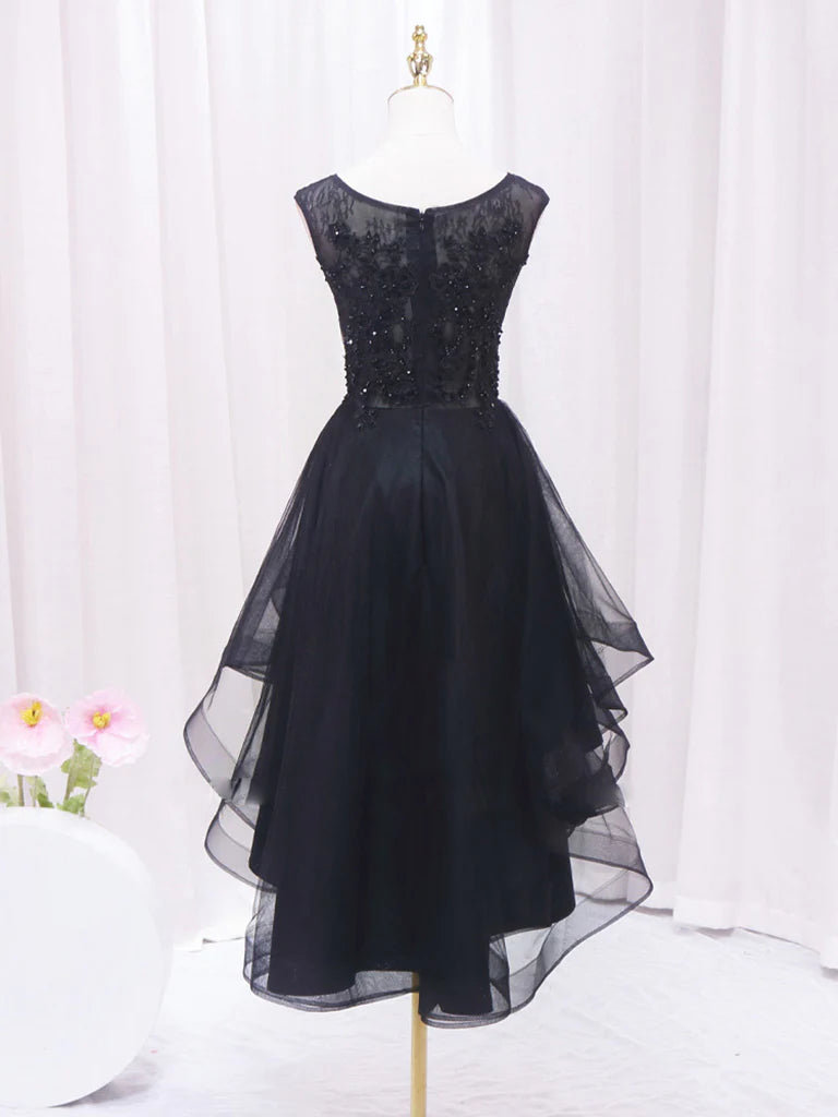 Side view of black A-line high-low dress.
