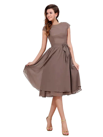 Back view of the mother of the bride dress, showing the button closure and A-line silhouette.